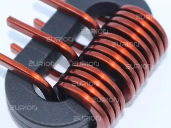 Large power inductor coil formed by the EC-680 edgewise winding machine for high-current applications.