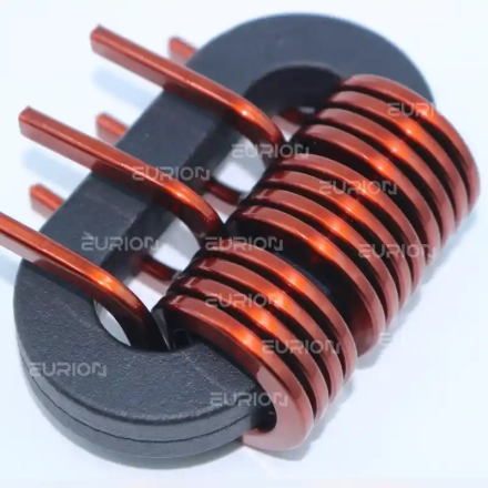 Large power inductor coil formed by the EC-680 edgewise winding machine for high-current applications.