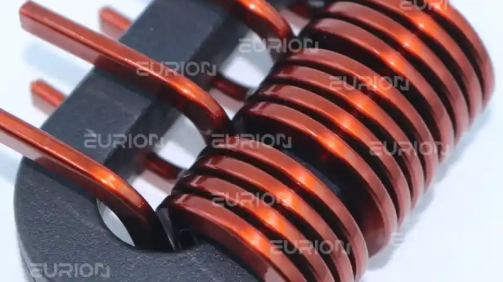 Large power inductor coil formed by the EC-680 edgewise winding machine for high-current applications.