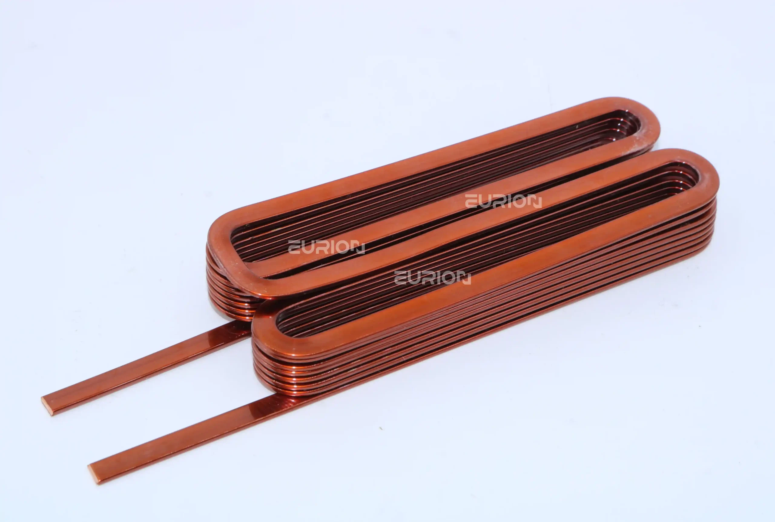 Continuous dual flat wire stator coil for radial flux motors with fewer bridge welding joints.